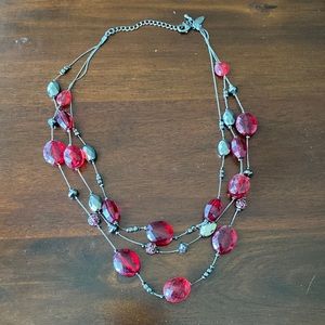 Red and charcoal colored necklace